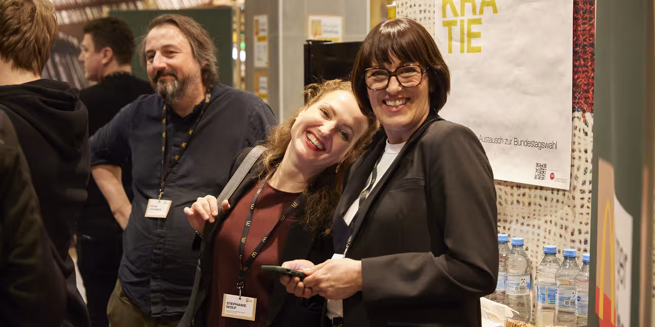 Drei Teilnehmer des McDonald´s Burgertag.