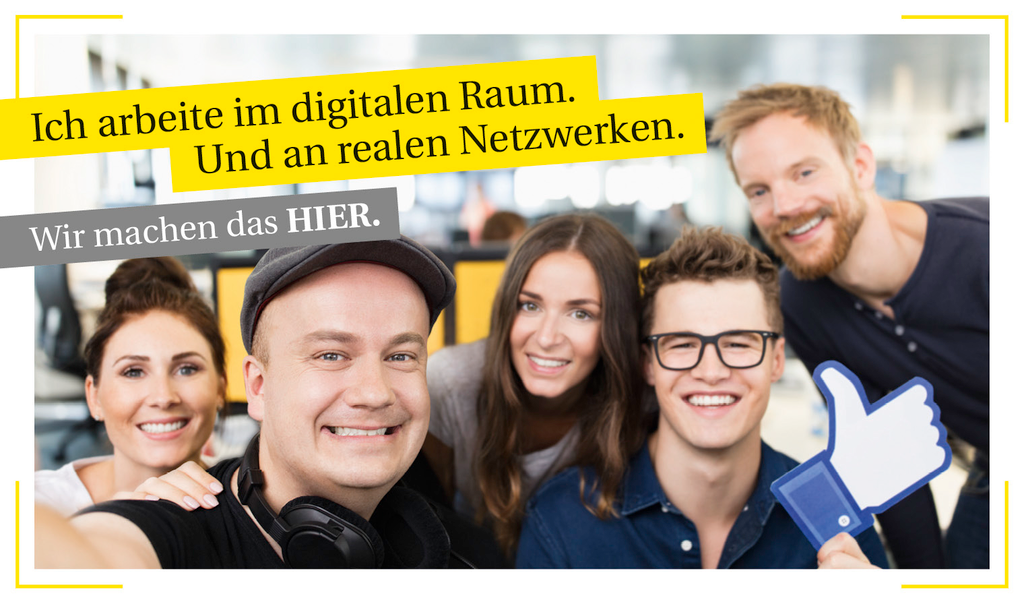 Mitarbeiter der Rheinischen Post Mediengruppe lachen in die Kamera.
