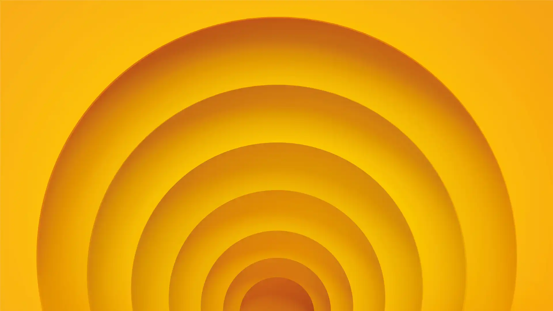 Kreisförmige Grafiken in Orange, die nach hinten wie ein Tunnel zulaufen