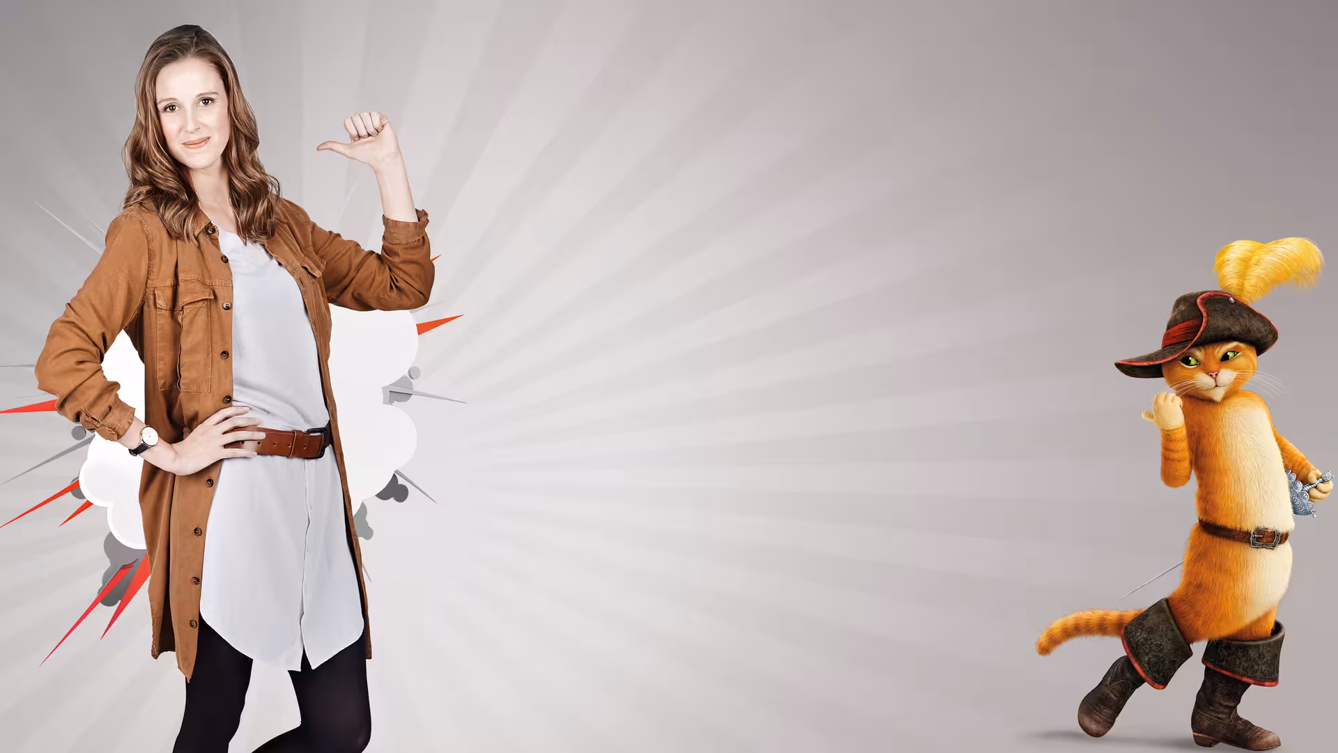 Eine SuperRTL-Mitarbeiterin und eine Comic-Figur stehen nebeneinander.